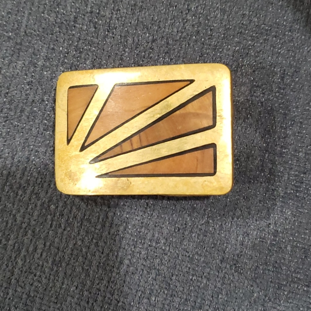 Brass belt buckle with wood inlay design